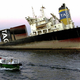 Cleanup crews work around the sinking tanker; Spike TV plans to air an original movie depicting the workers' efforts later this fall.